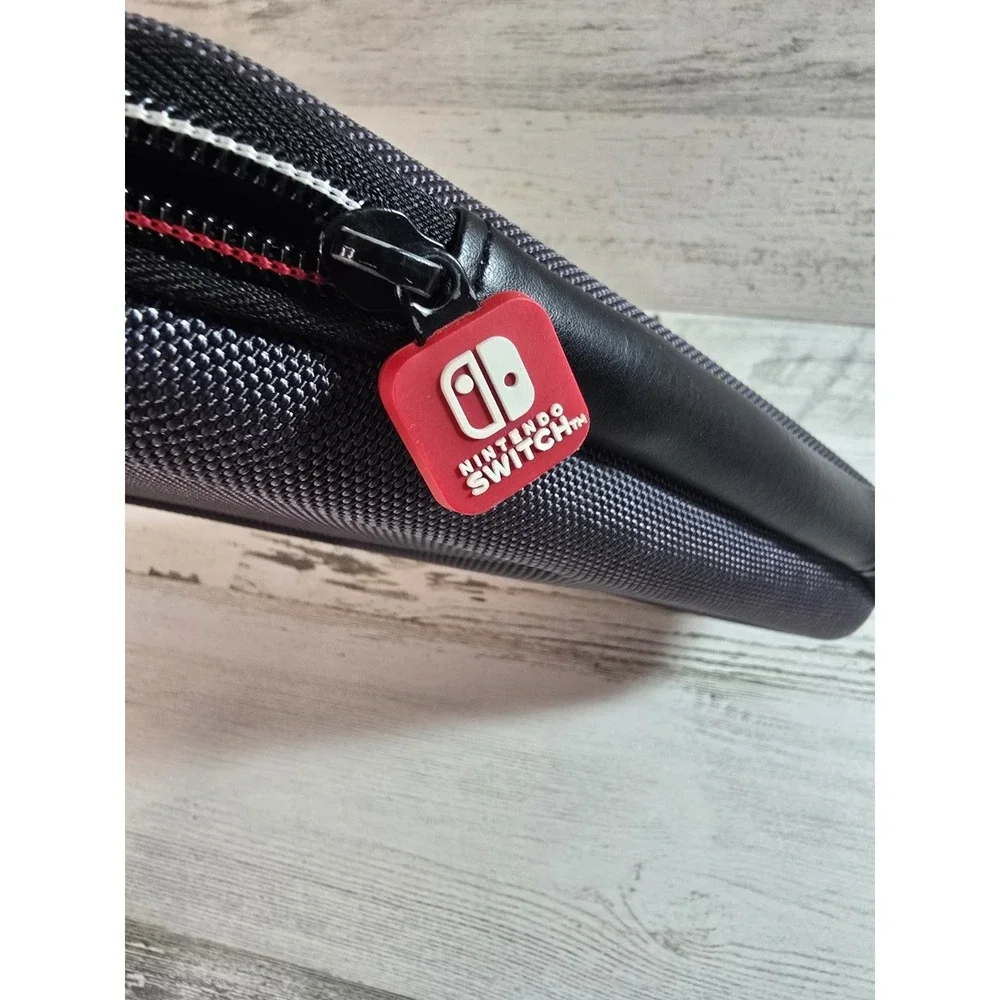 Nintendo Switch Deluxe Travel Case Charcoal Gray Hardshell Carrying‎ Pouch Logo
